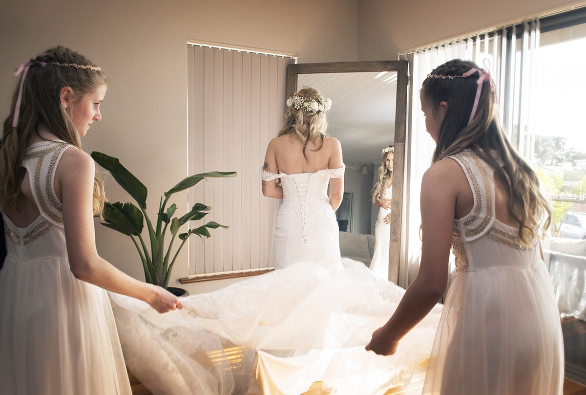pepper tree cafe wedding - amanda & daniel 91 Helping with the dress