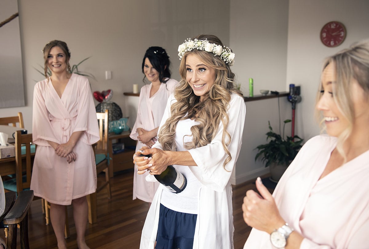 pepper tree cafe wedding - amanda & daniel 90 Cork popping