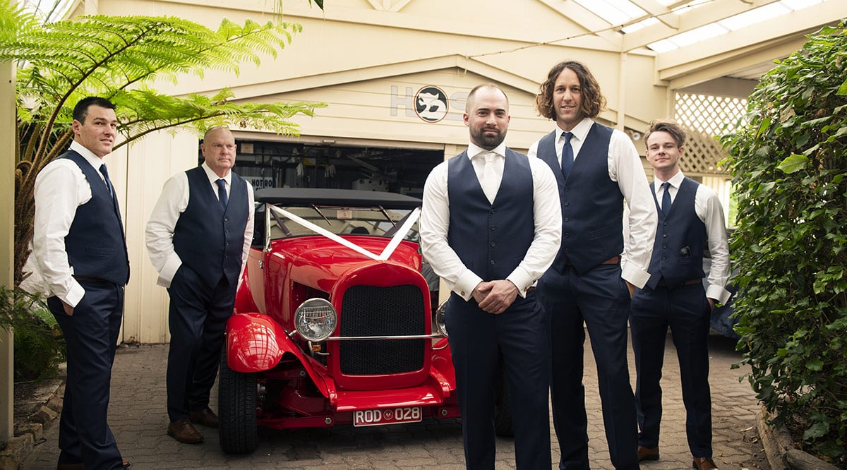 pepper tree cafe wedding - amanda & daniel 81 In front of car