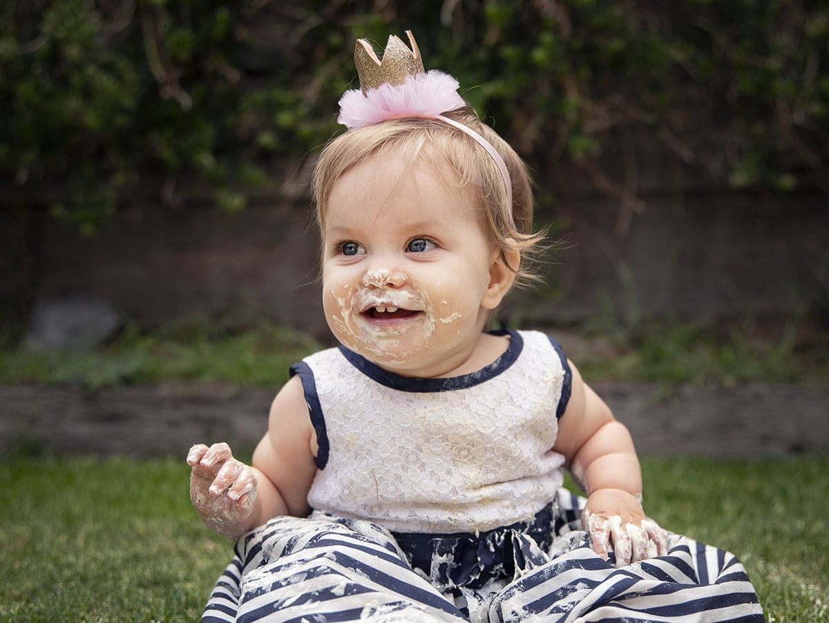 one year's worth of portraits of baby chloe 18 lookie