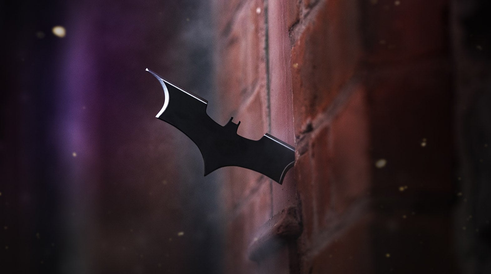Batman cosplay batarang in wall