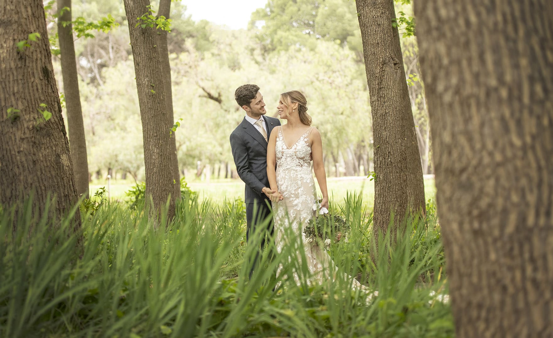 seppeltsfield winery wedding - tahlia & alex 66 Bride and groom standing with each other in trees at Seppeltsfield winery