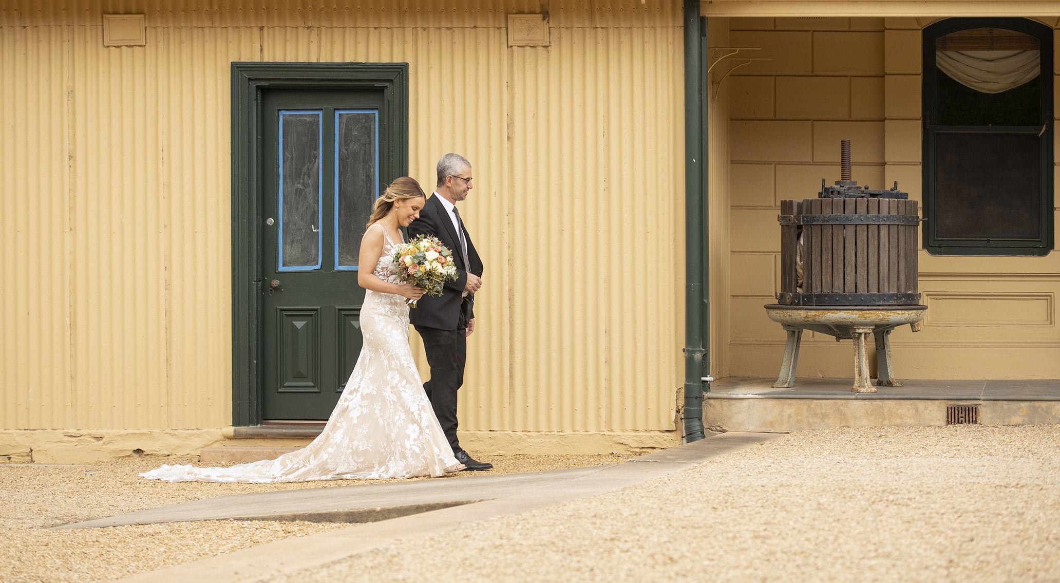 seppeltsfield winery wedding - tahlia & alex 43 bride being walked down aisle