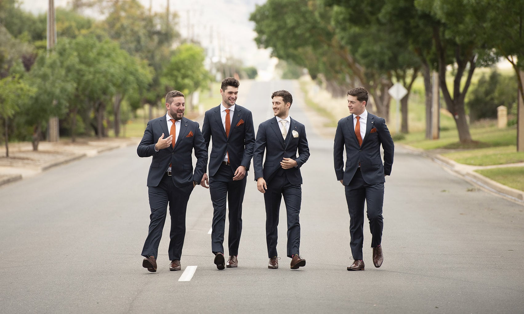 seppeltsfield winery wedding - tahlia & alex 11 Groom and grooms men walking down road