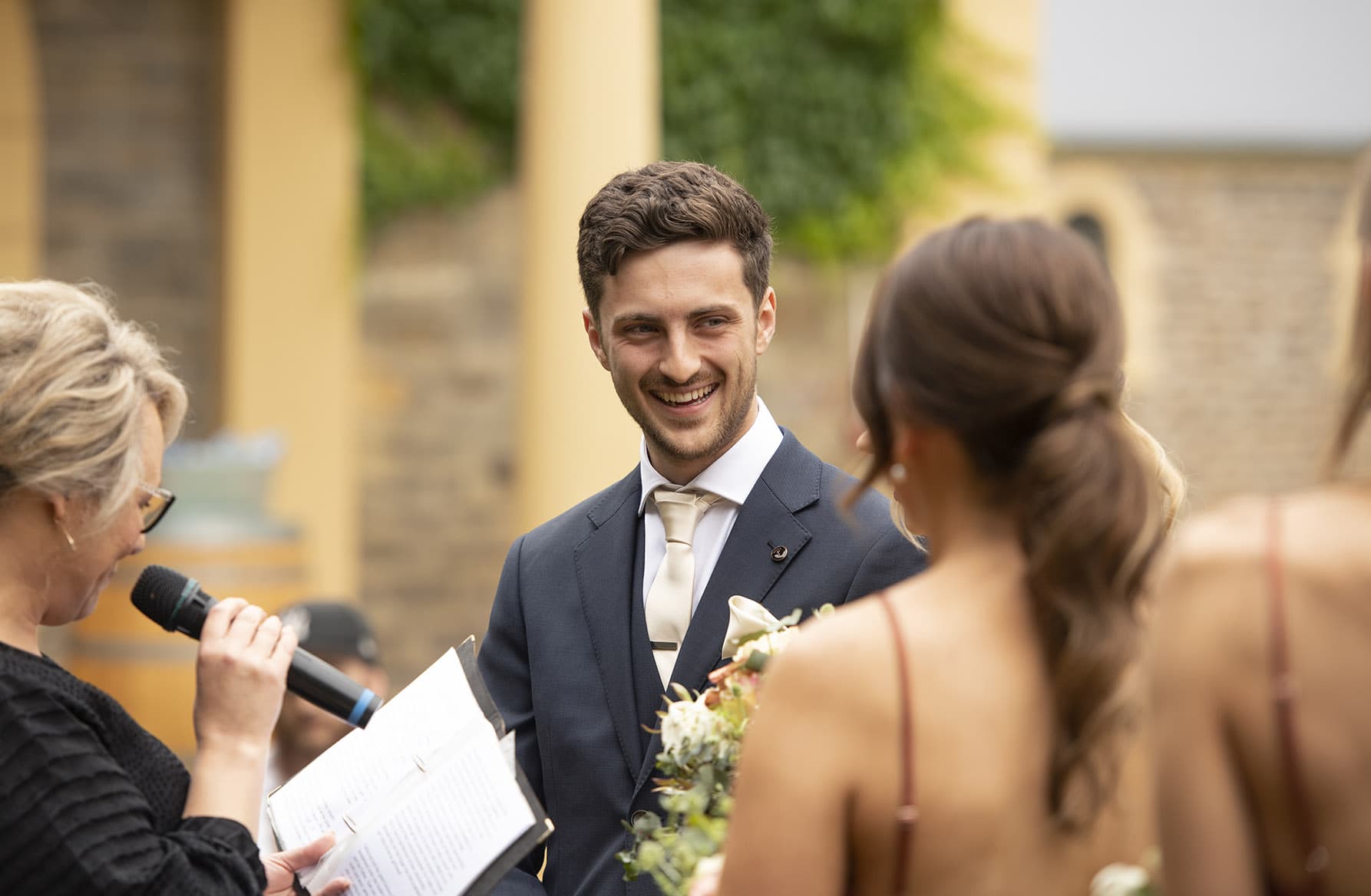 seppeltsfield winery wedding - tahlia & alex 47 Laughing groom during ceremony 2