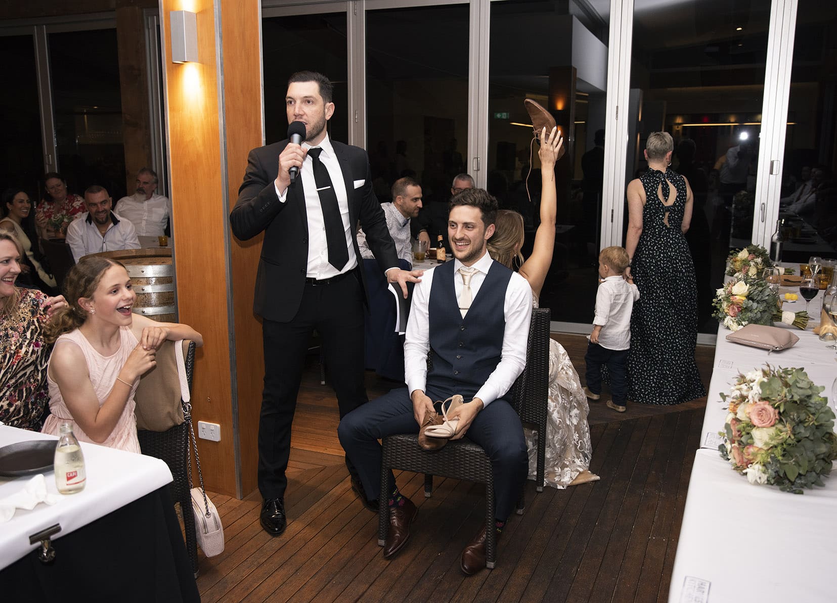 seppeltsfield winery wedding - tahlia & alex 80 Wedding shoe game at Harvest Kitchen Reception