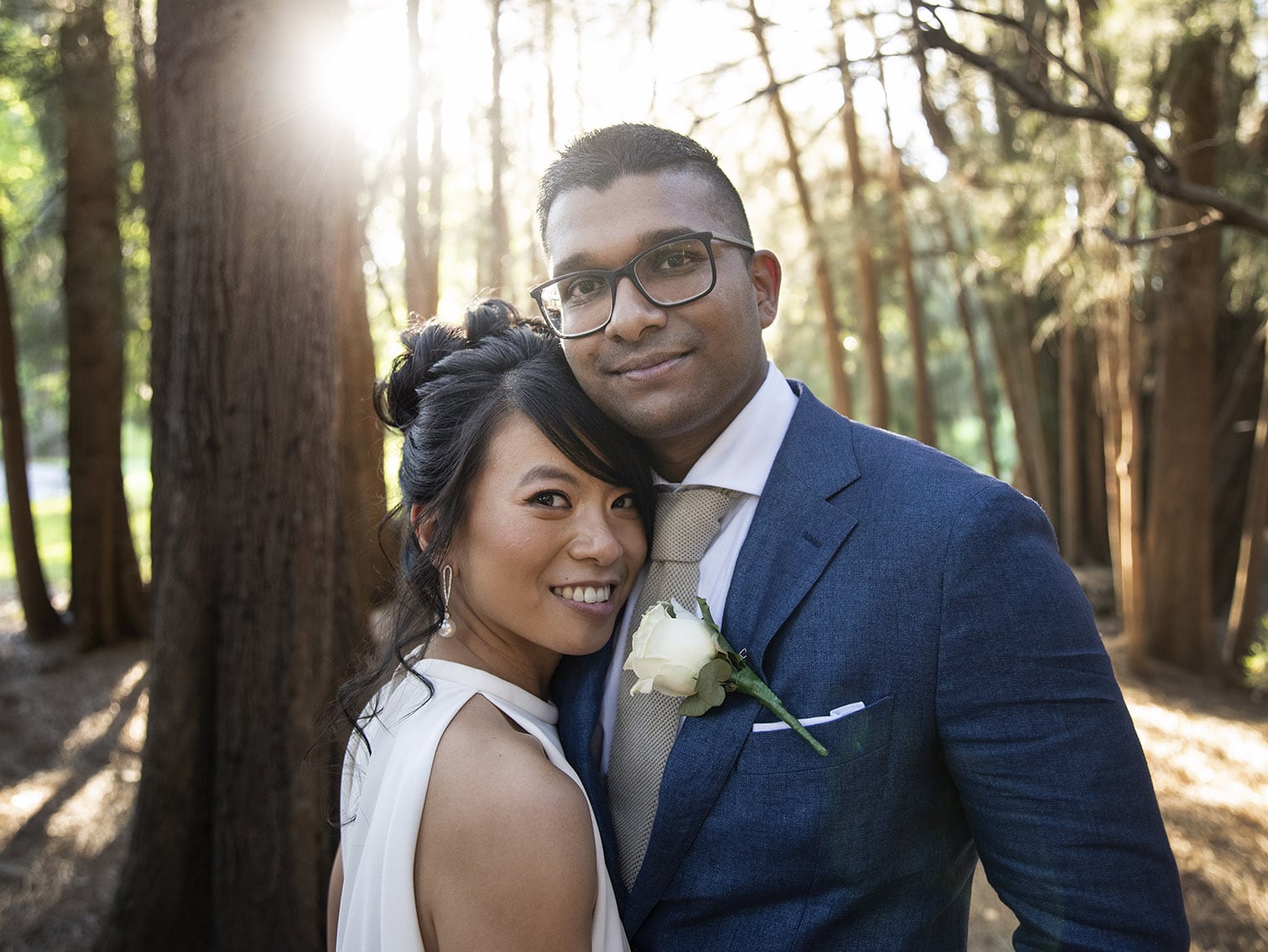debunking common myths about wedding photography 19 bride and groom looking at camera on their wedding day