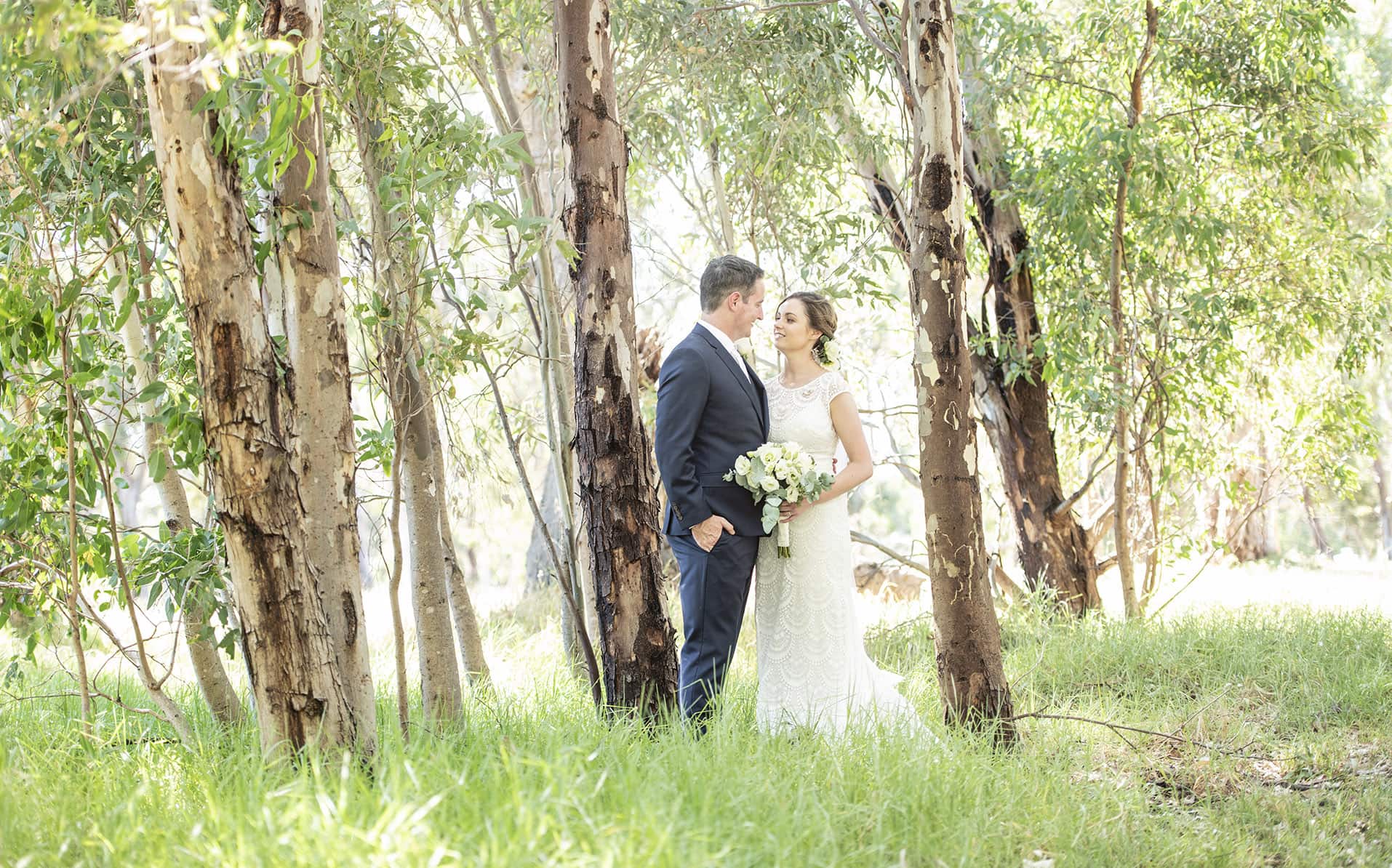 serafino wines wedding - claire & arron 57 Bridal couple amongst the trees at Serafino WInes