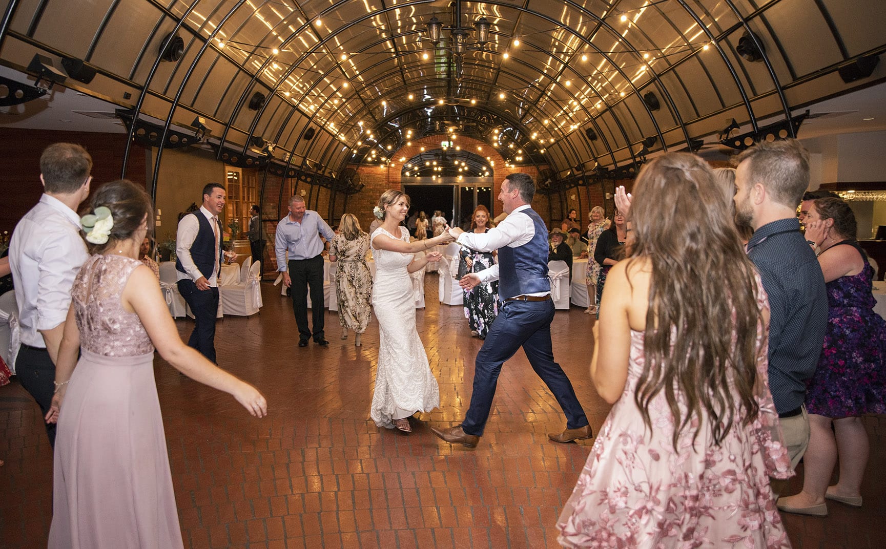 serafino wines wedding - claire & arron 79 Bride and groom dancing amongst guests