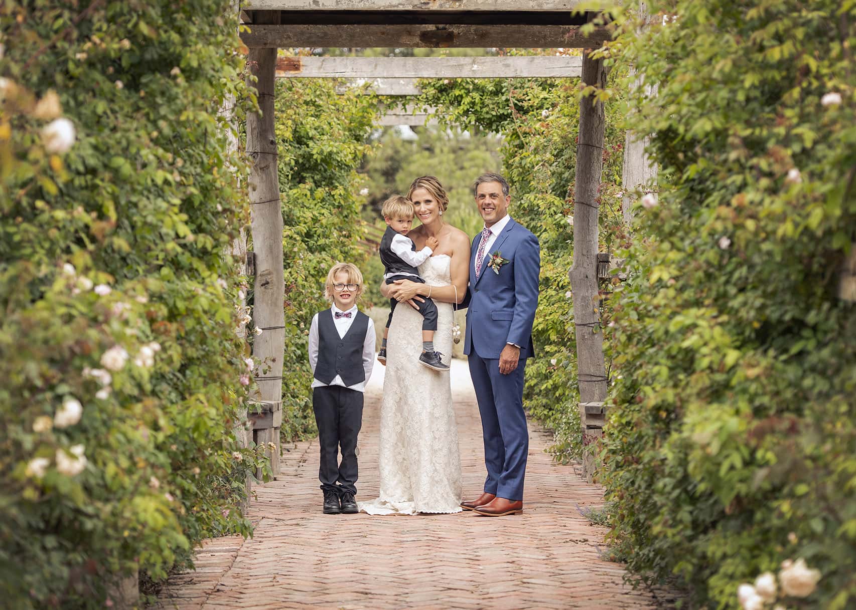 crabtree farm wedding - sarah & elten 23 family photo in the walkway