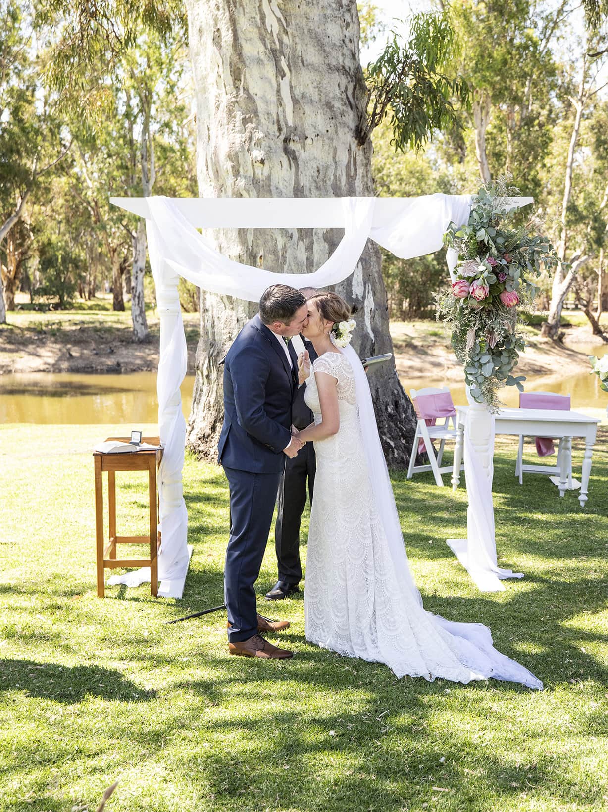 serafino wines wedding - claire & arron 47 First kiss at serafino wines wedding ceremony