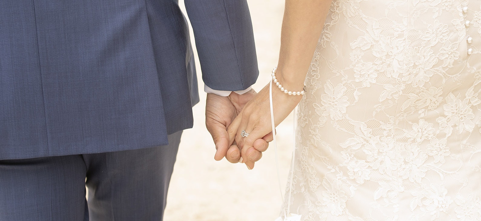 crabtree farm wedding - sarah & elten 34 Holding hands on walk back to reception