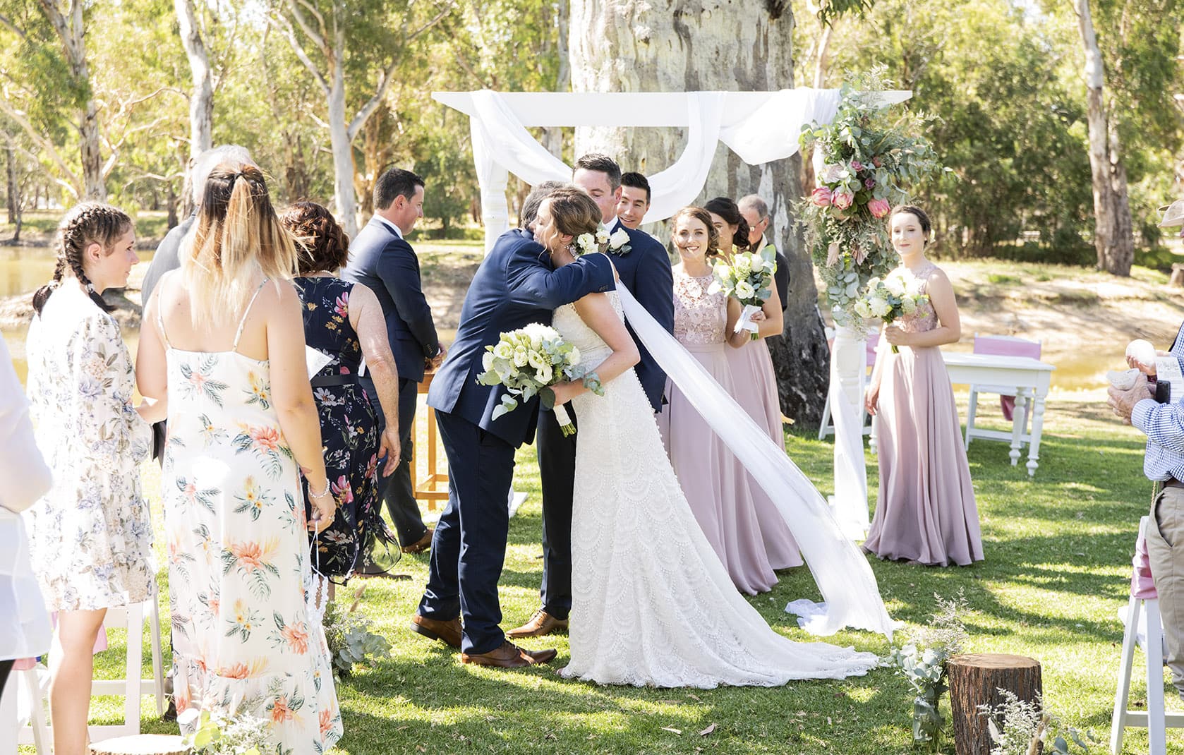serafino wines wedding - claire & arron 50 Hugs as the bridal couple exits