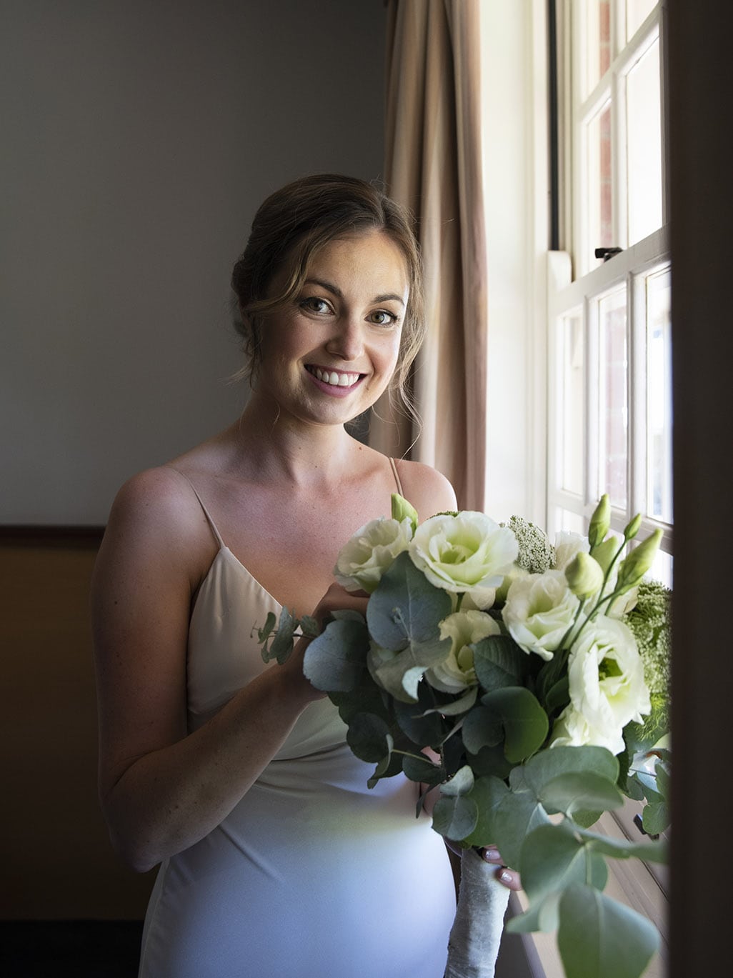 serafino wines wedding - claire & arron 25 Pretty bride holding bouquet