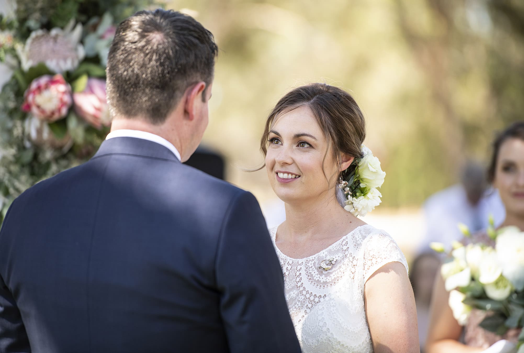 serafino wines wedding - claire & arron 43 Smiling bride looking at her groom