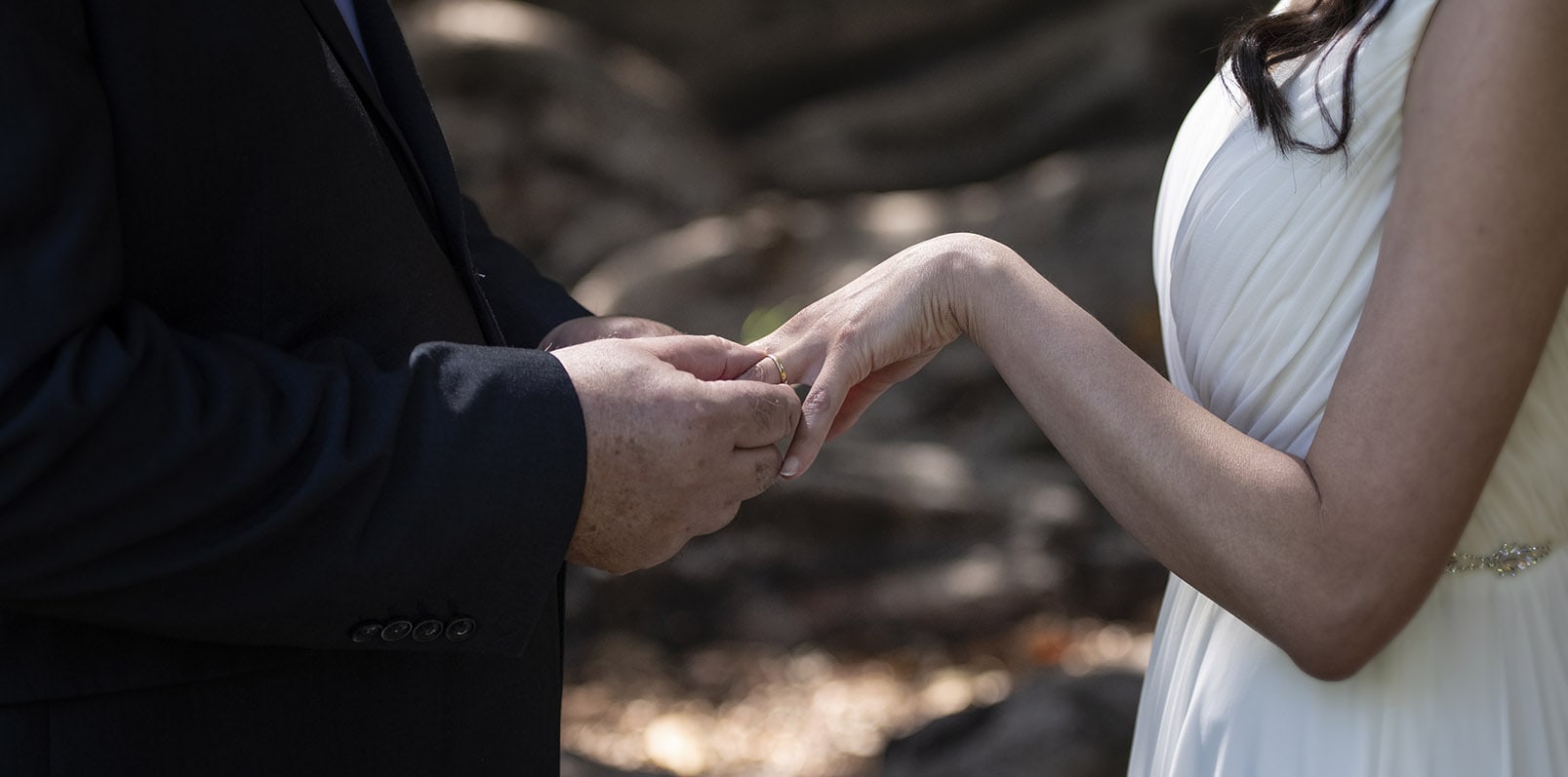 botanic park wedding - naz & peter 18 Exchanging wedding rings on bent arm