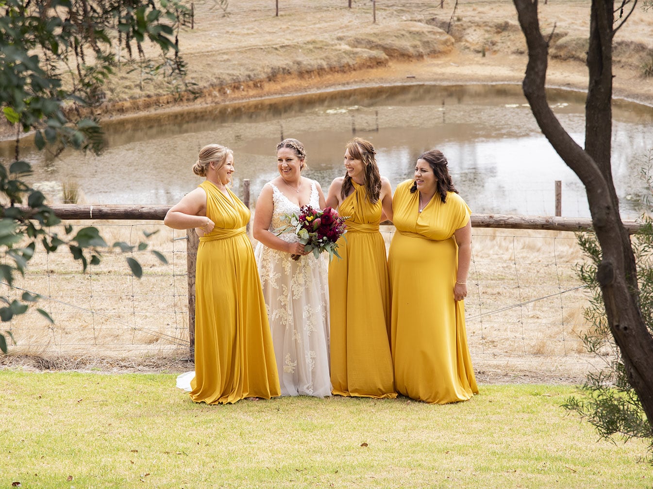 old oval estate wedding - suzie & jay 73 All the bridesmaids together in front of pond