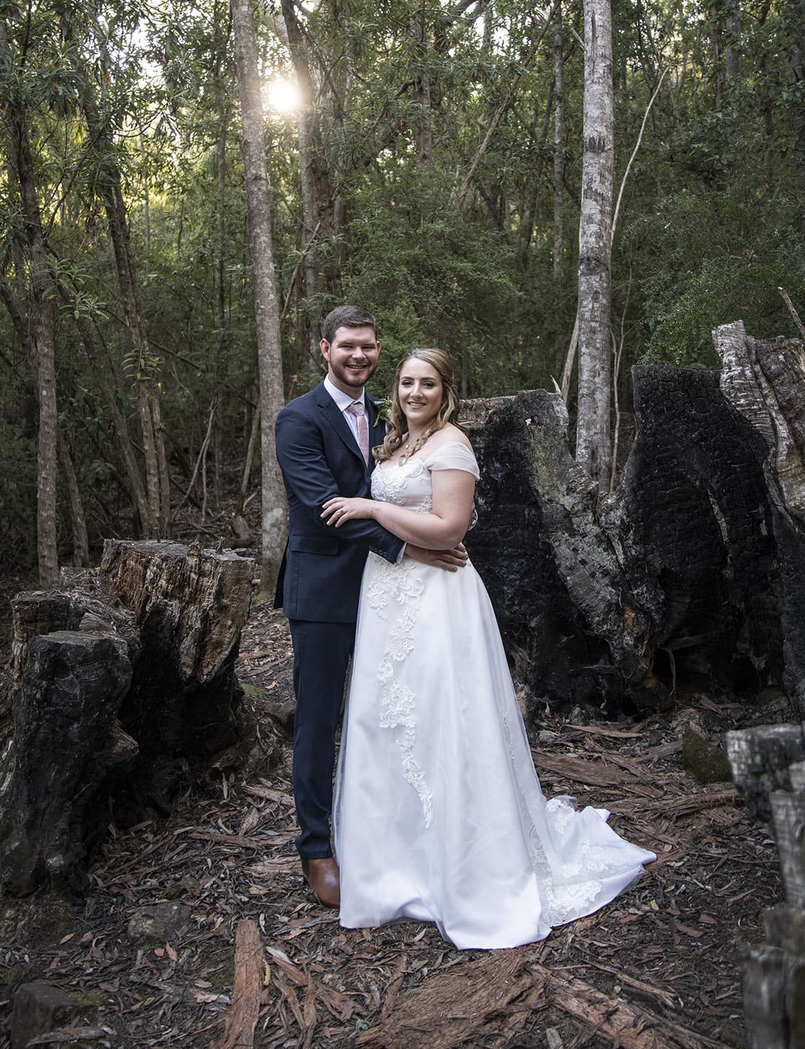 seagrass long point wedding - hobart - georgia & matt 6 bride and groom in tree stump