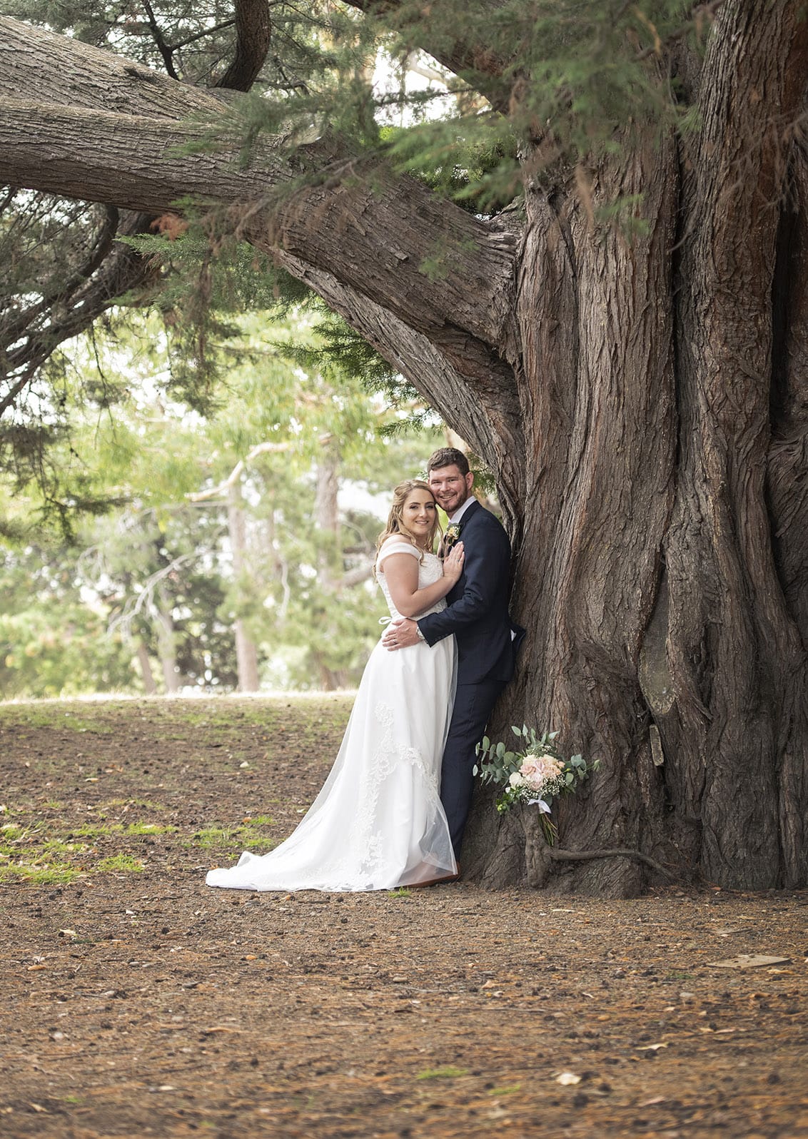 seagrass long point wedding - hobart - georgia & matt 68 bride and groom leaning against a large tree