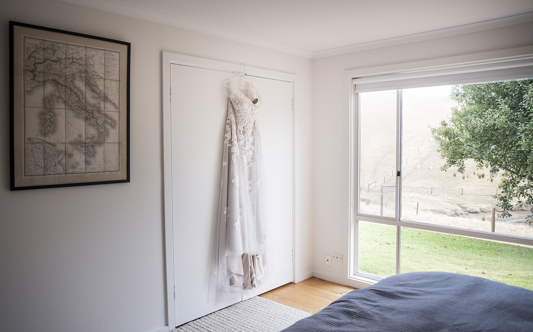 old oval estate wedding - suzie & jay 68 Hanging wedding dress on cupboard door