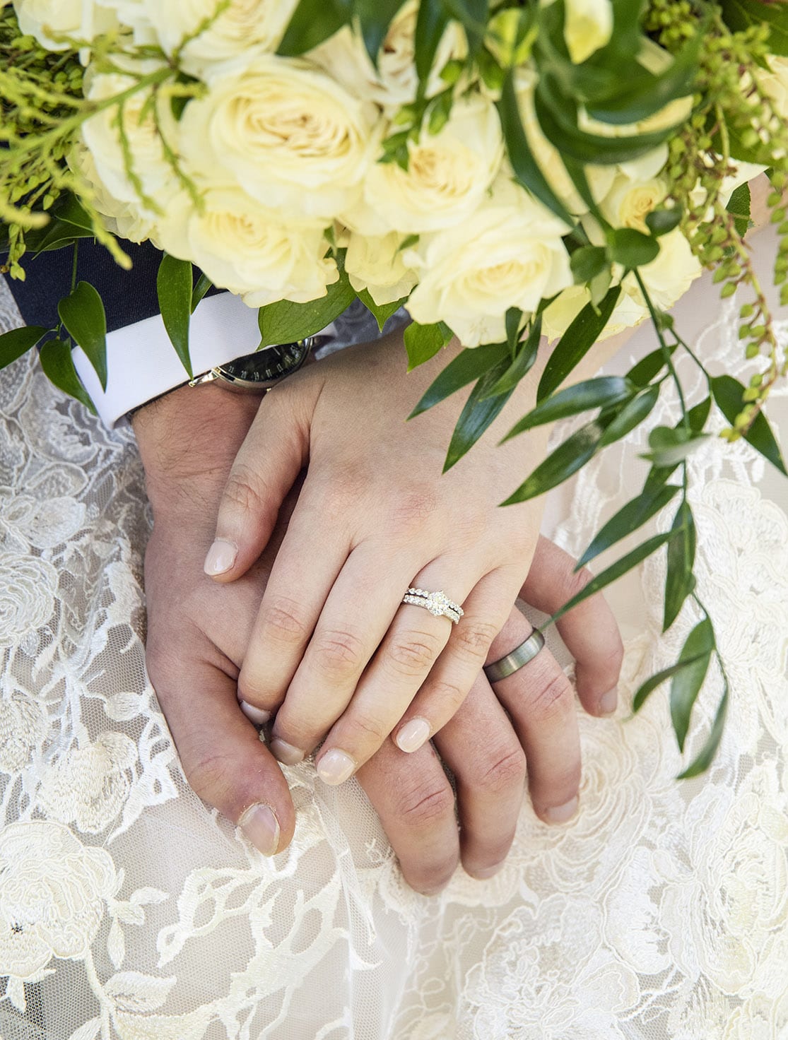 national wine center wedding - pat & kat 158 Closeup of wedding rings on hands