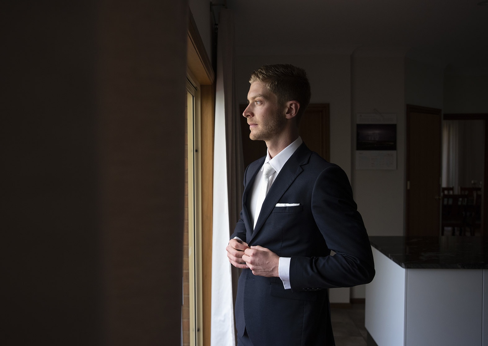 5 wedding moments that look good when naturally captured 8 Groom staring out window