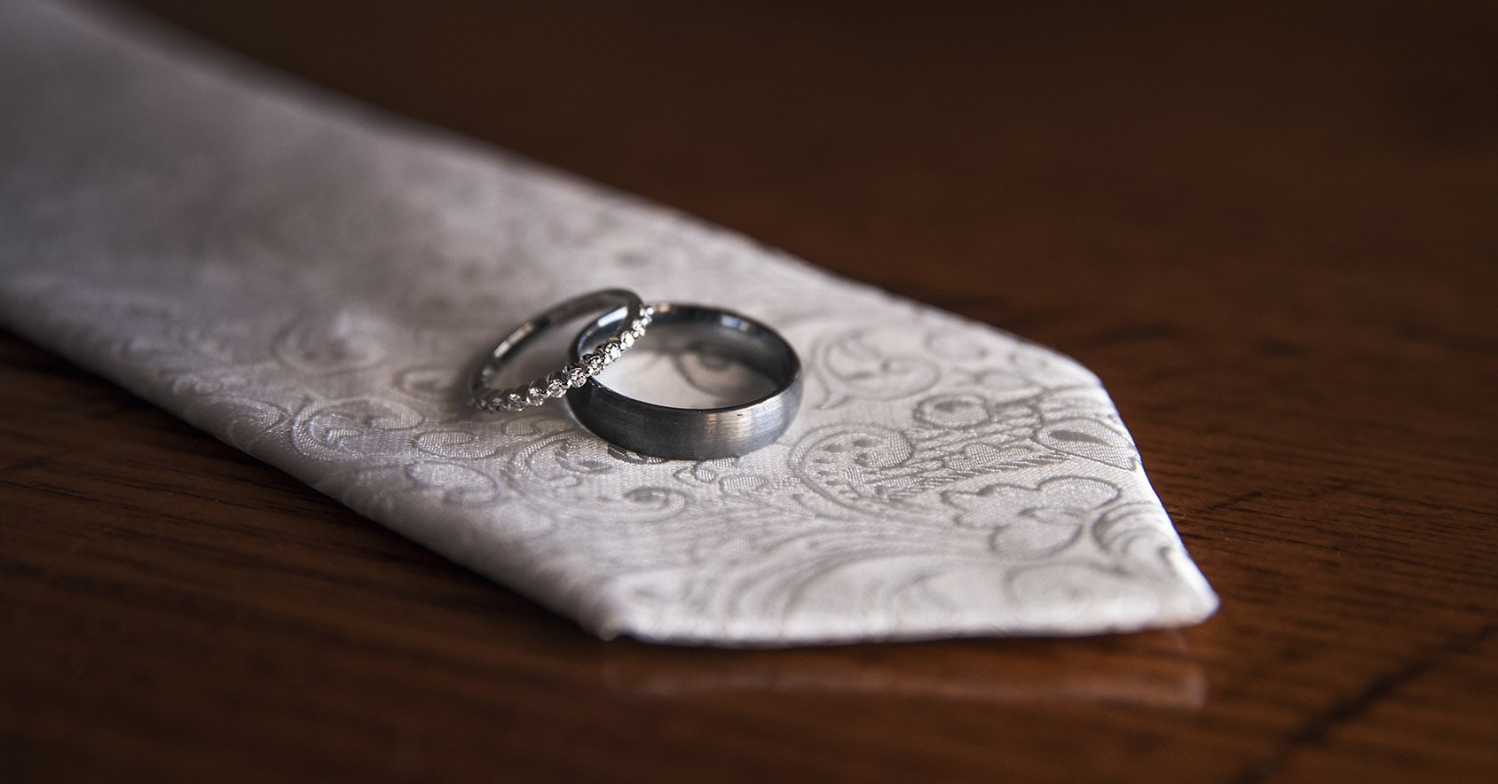 national wine center wedding - pat & kat 109 Wedding rings on grooms tie
