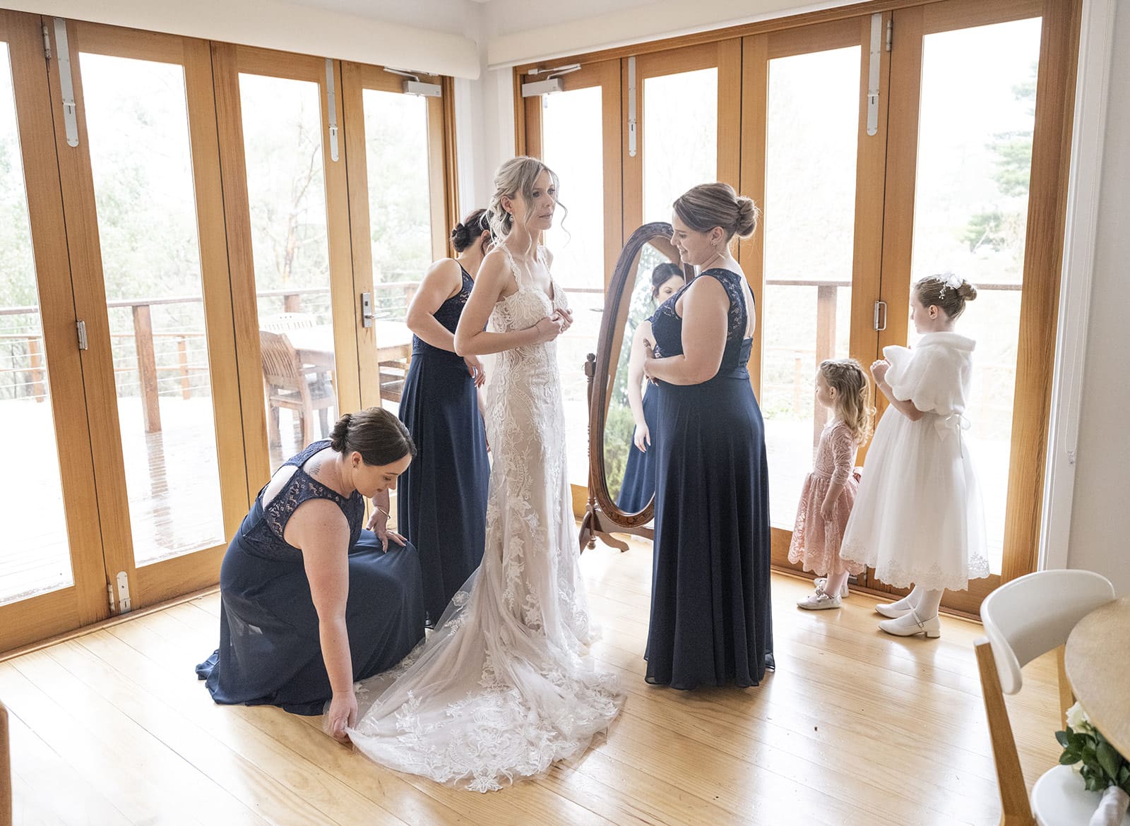 mount lofty house wedding - katrina & lucas 24 bridal party fussing over bride