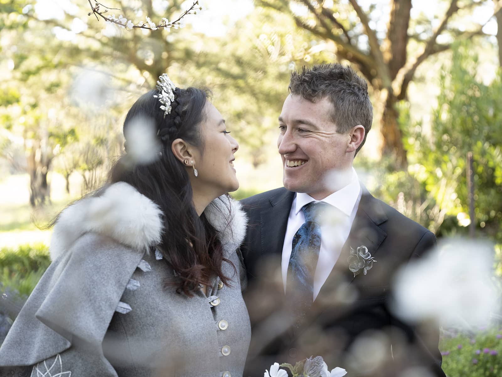 mount torrens hotel wedding - clare & craig 54 bride and groom through flowers