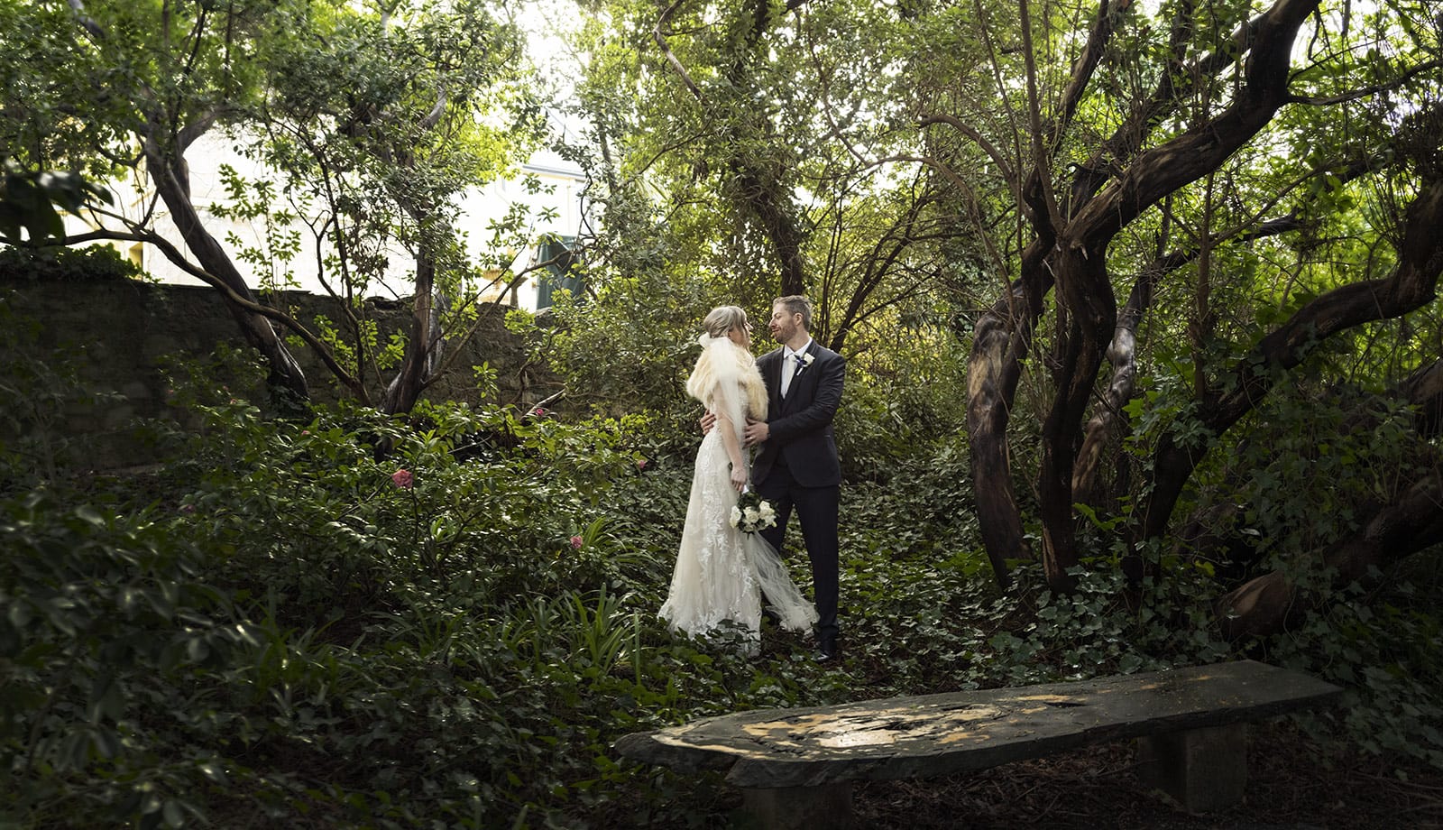mount lofty house wedding - katrina & lucas 44 Bride and groom under the trees of Mount Lofty House