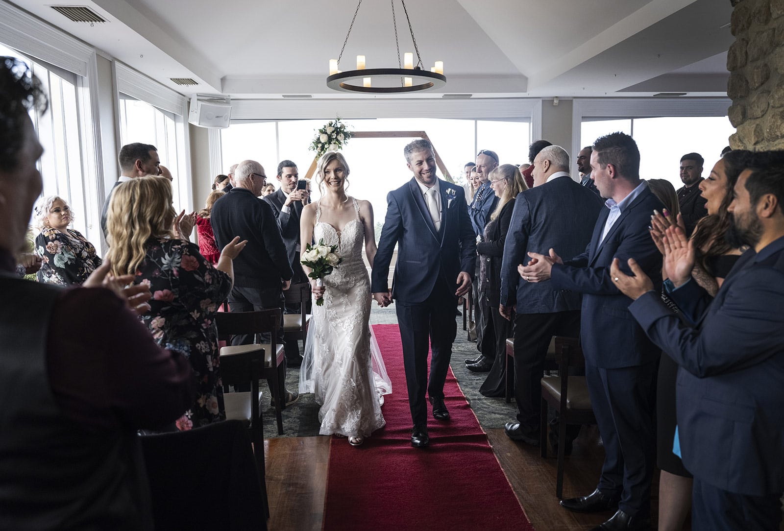 mount lofty house wedding - katrina & lucas 43 Bride and groom walks back down the aisle