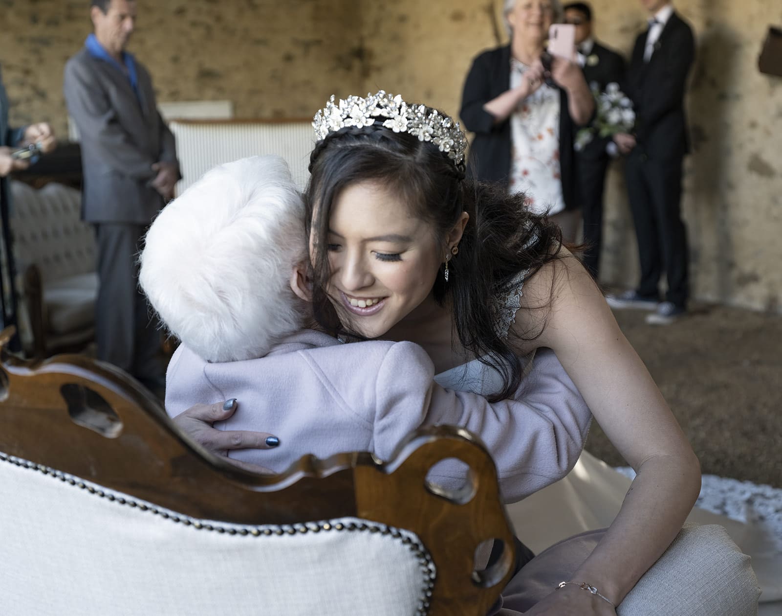mount torrens hotel wedding - clare & craig 48 Bride hugging guests