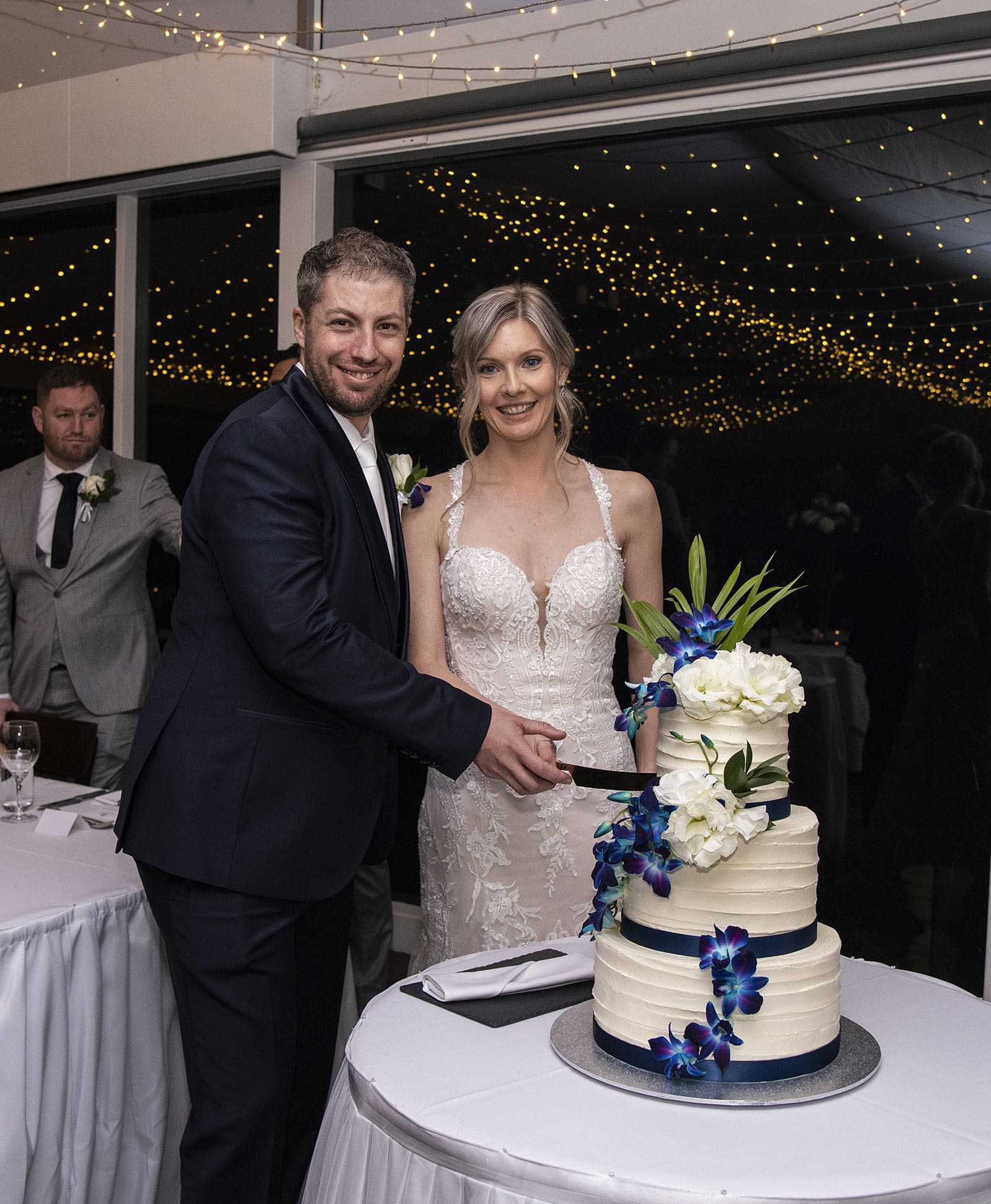 mount lofty house wedding - katrina & lucas 66 Husband and wife cutting their wedding cake