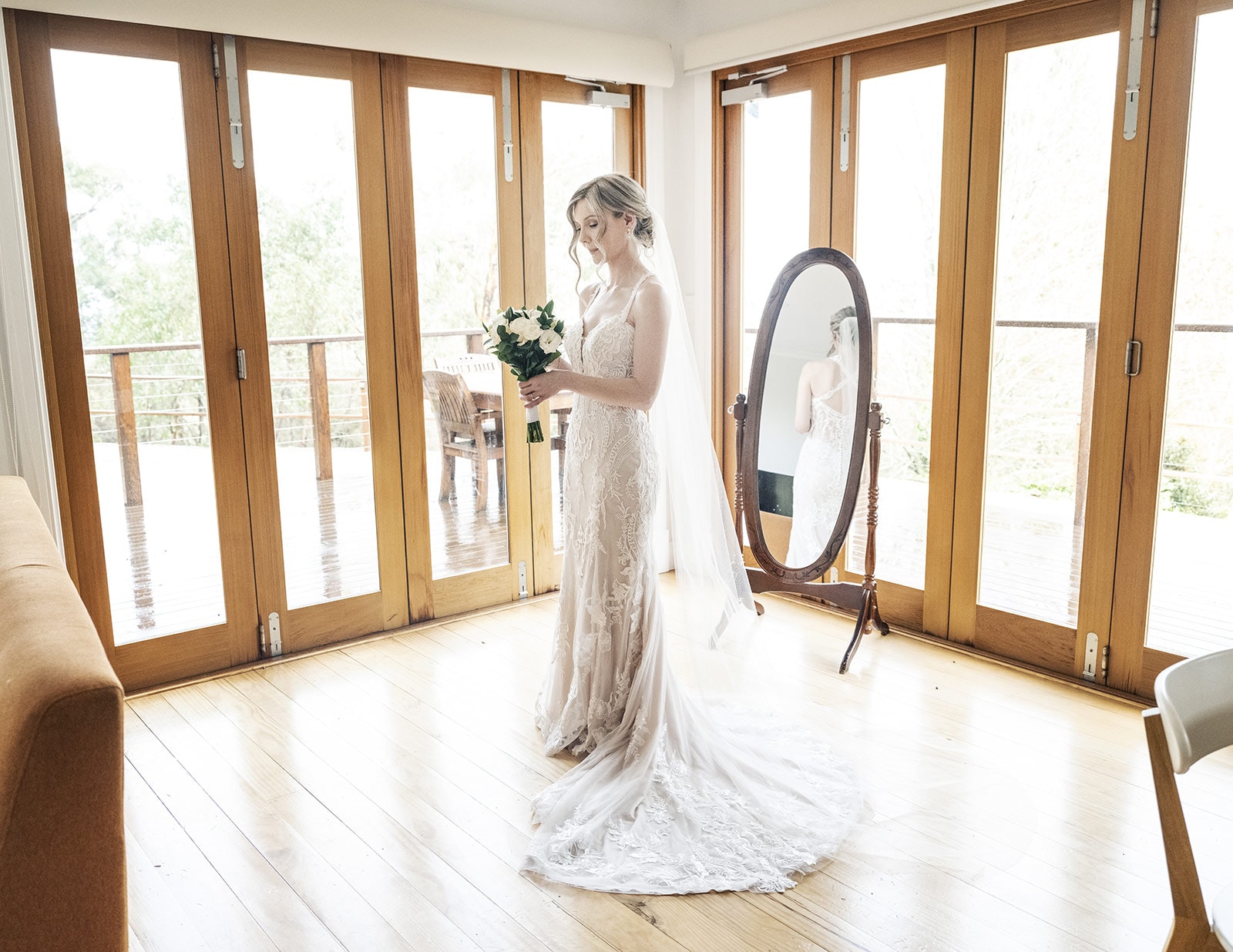 mount lofty house wedding - katrina & lucas 26 pretty bride standing in windowed area