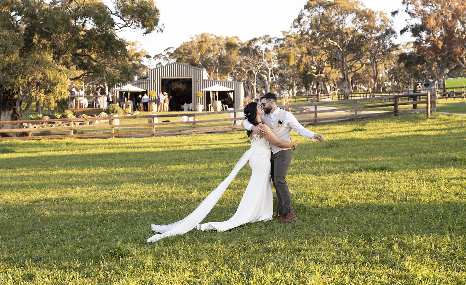 Bride and groom in front of the Quince Brook wedding venue