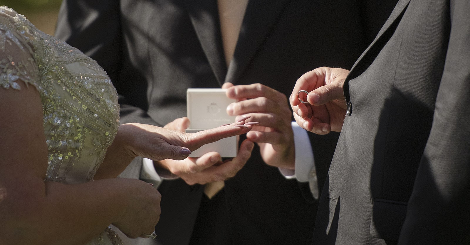 lake breeze wines wedding - cate & renato 33 About to exchange wedding rings