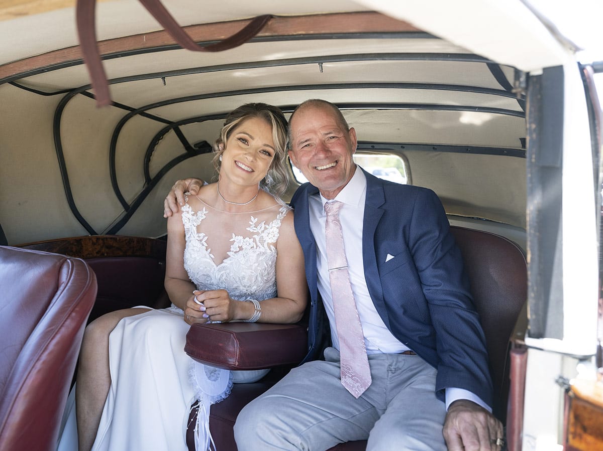 big easy radio wedding - leanne & evan 10 Bride and Father in car together