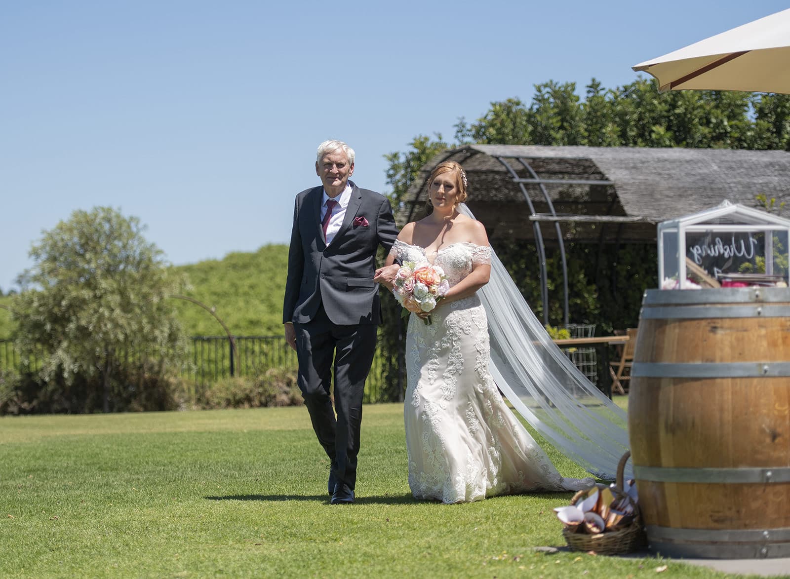 coriole wines wedding - marielle & brendan 36 Bride and Father walking toward ceremony