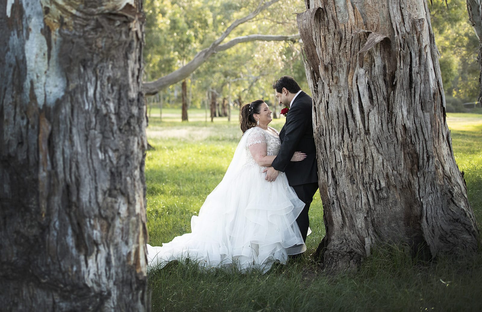 lake breeze wines wedding - cate & renato 42 bride and groom together between gum trees