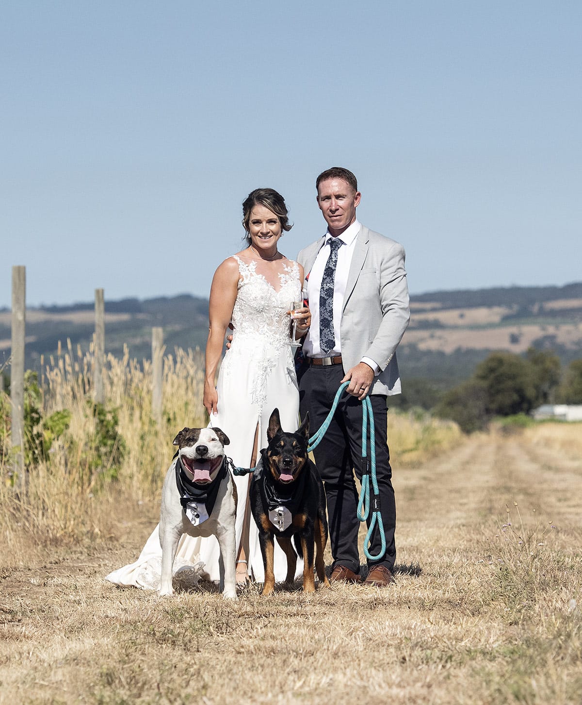 big easy radio wedding - leanne & evan 43 bride and groom with their dogs