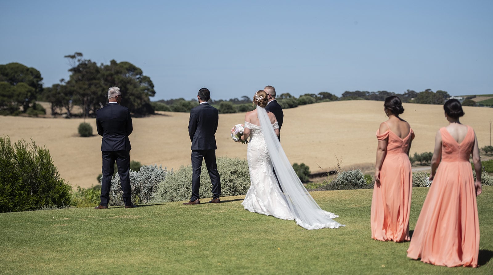 coriole wines wedding - marielle & brendan 21 bride apporaching groom