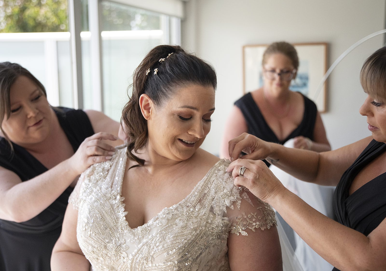 lake breeze wines wedding - cate & renato 17 Bride having help getting ready