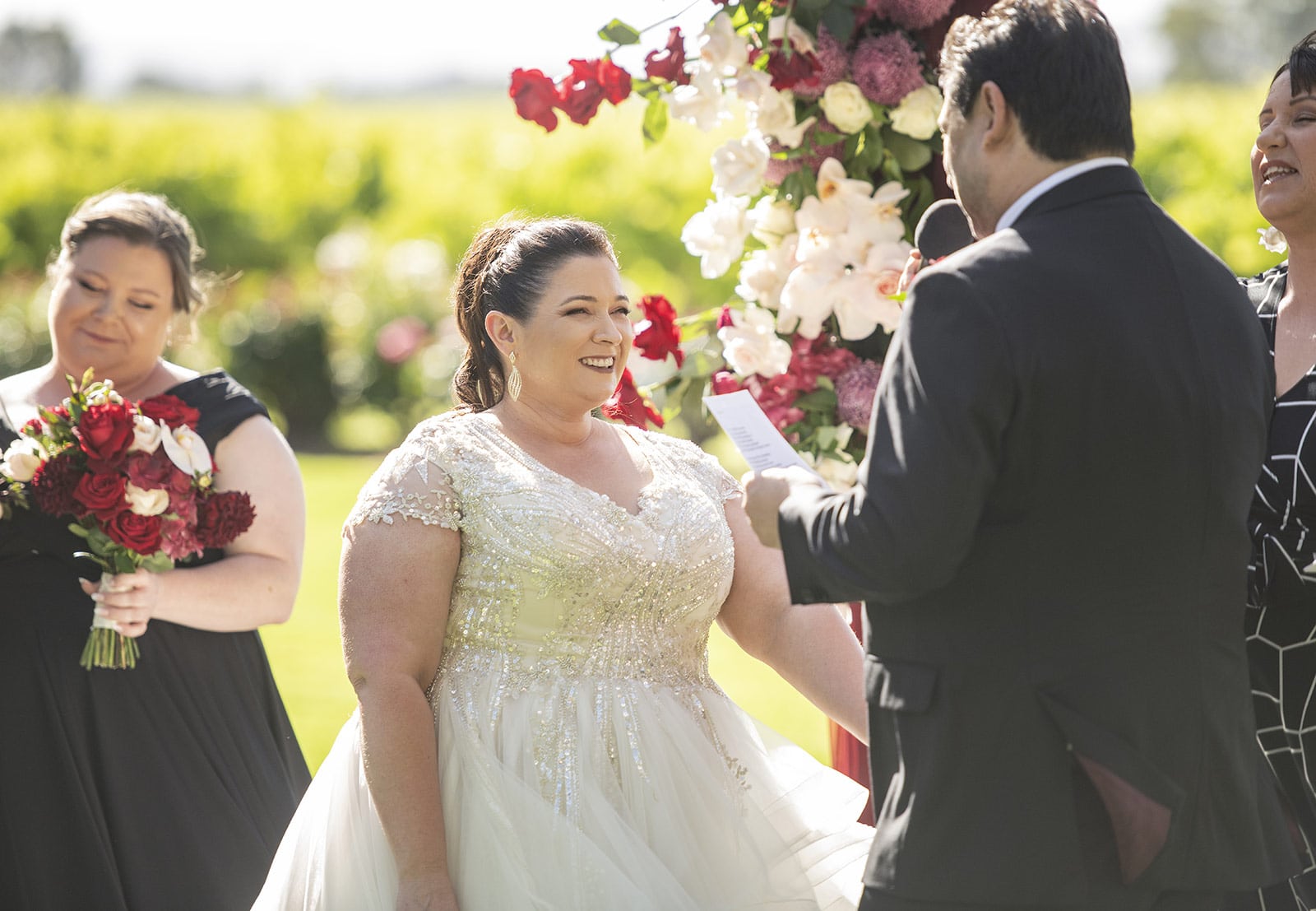 lake breeze wines wedding - cate & renato 32 bride holding her grooms hand