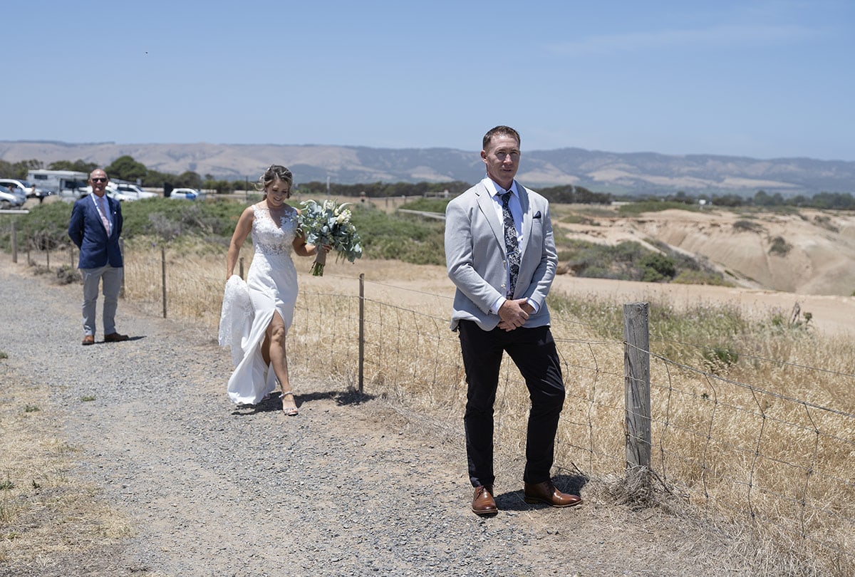 big easy radio wedding - leanne & evan 11 Bride walking toward groom for first look
