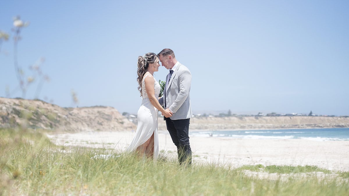 big easy radio wedding - leanne & evan 17 Bried and groom together amongst the sand dunes
