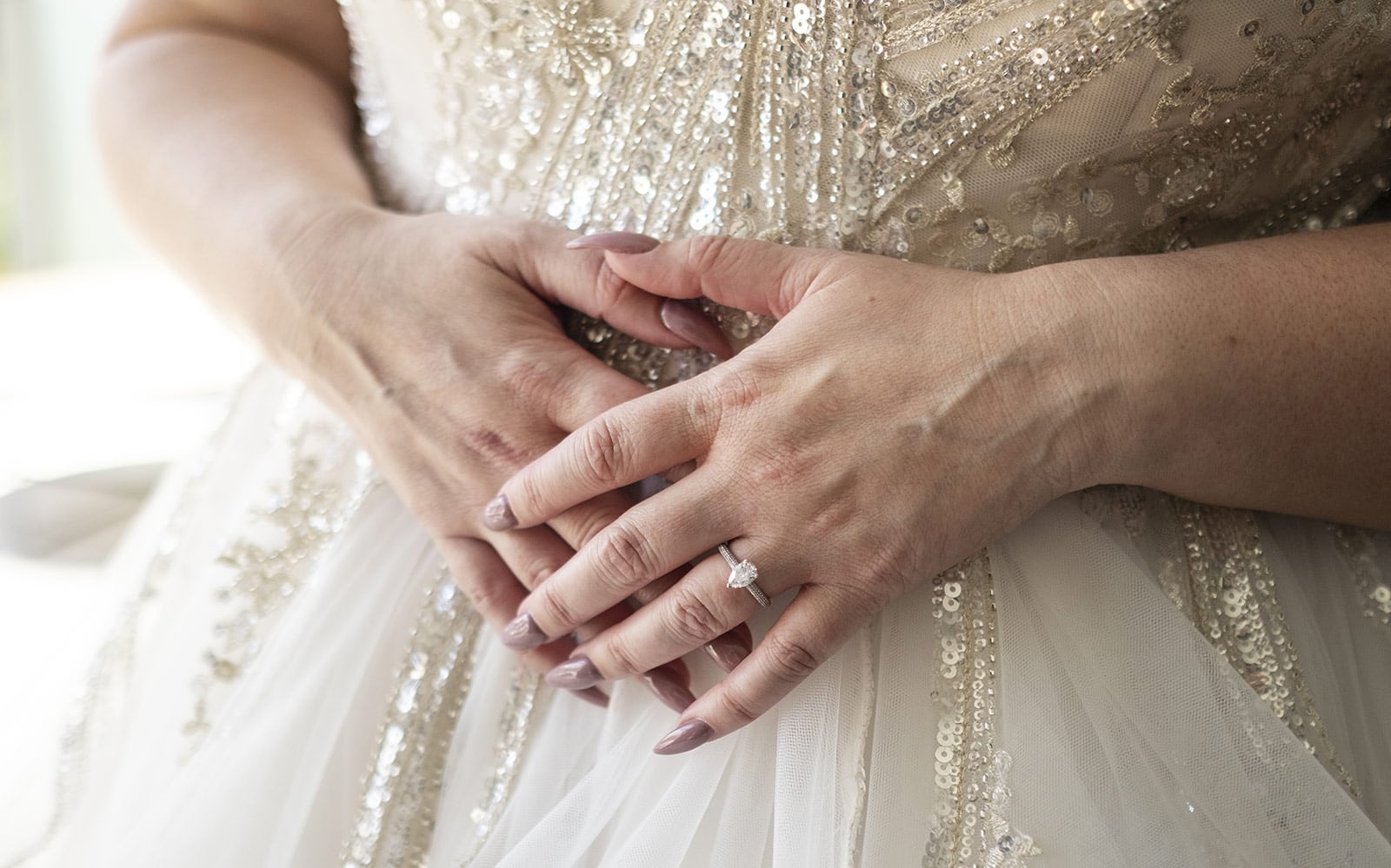 lake breeze wines wedding - cate & renato 16 Closeup of brides hands