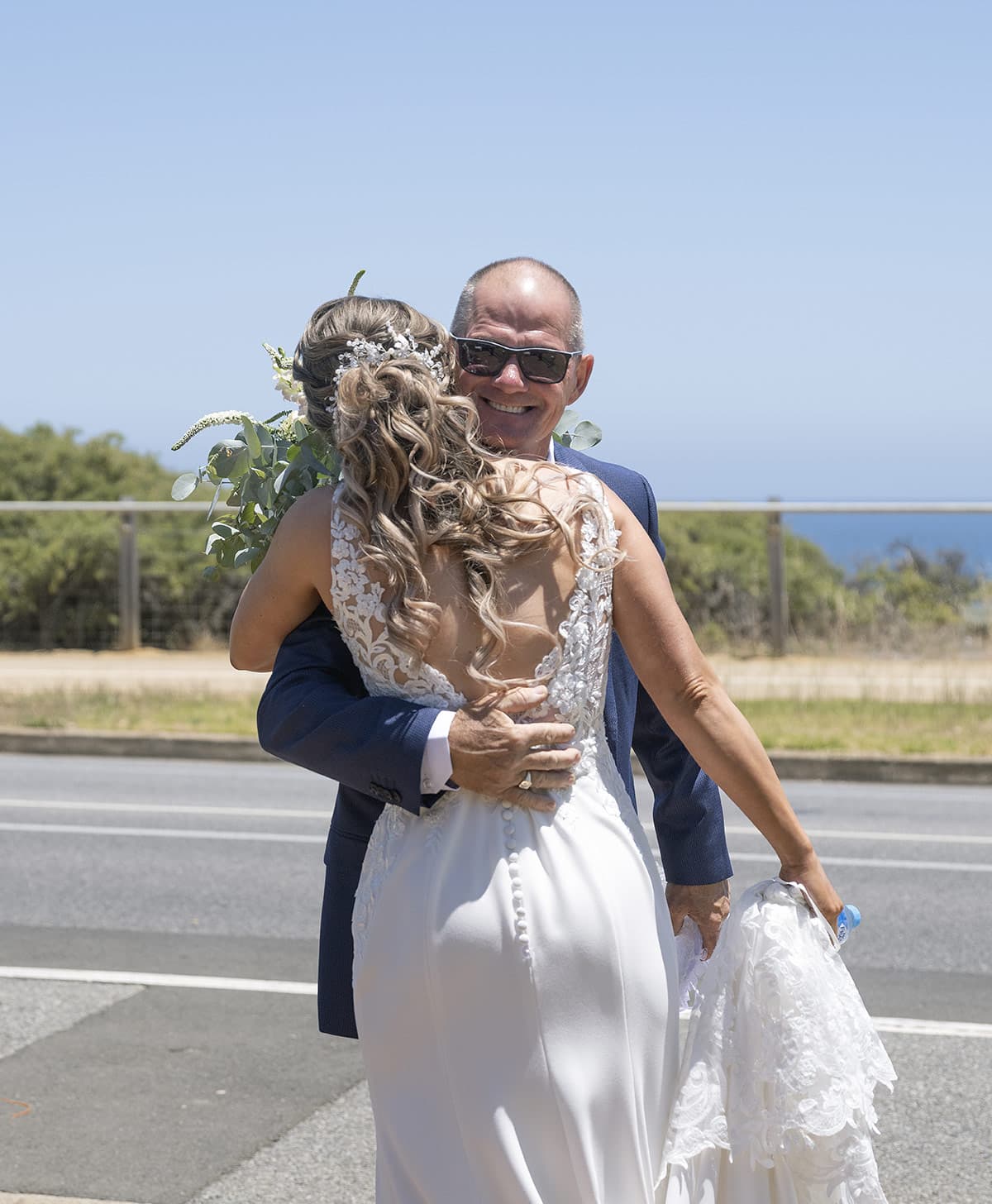big easy radio wedding - leanne & evan 9 Dad hugs bride for first look