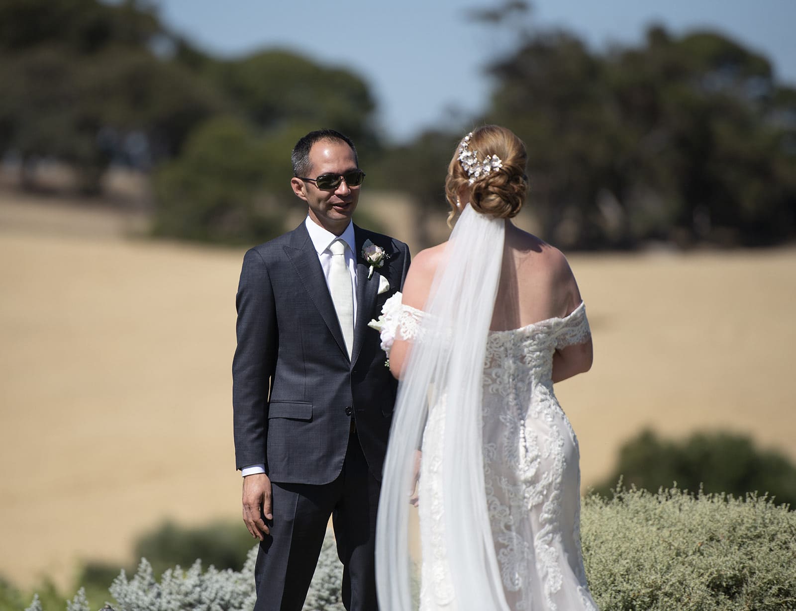 coriole wines wedding - marielle & brendan 23 Groom seeing bride for first time closer