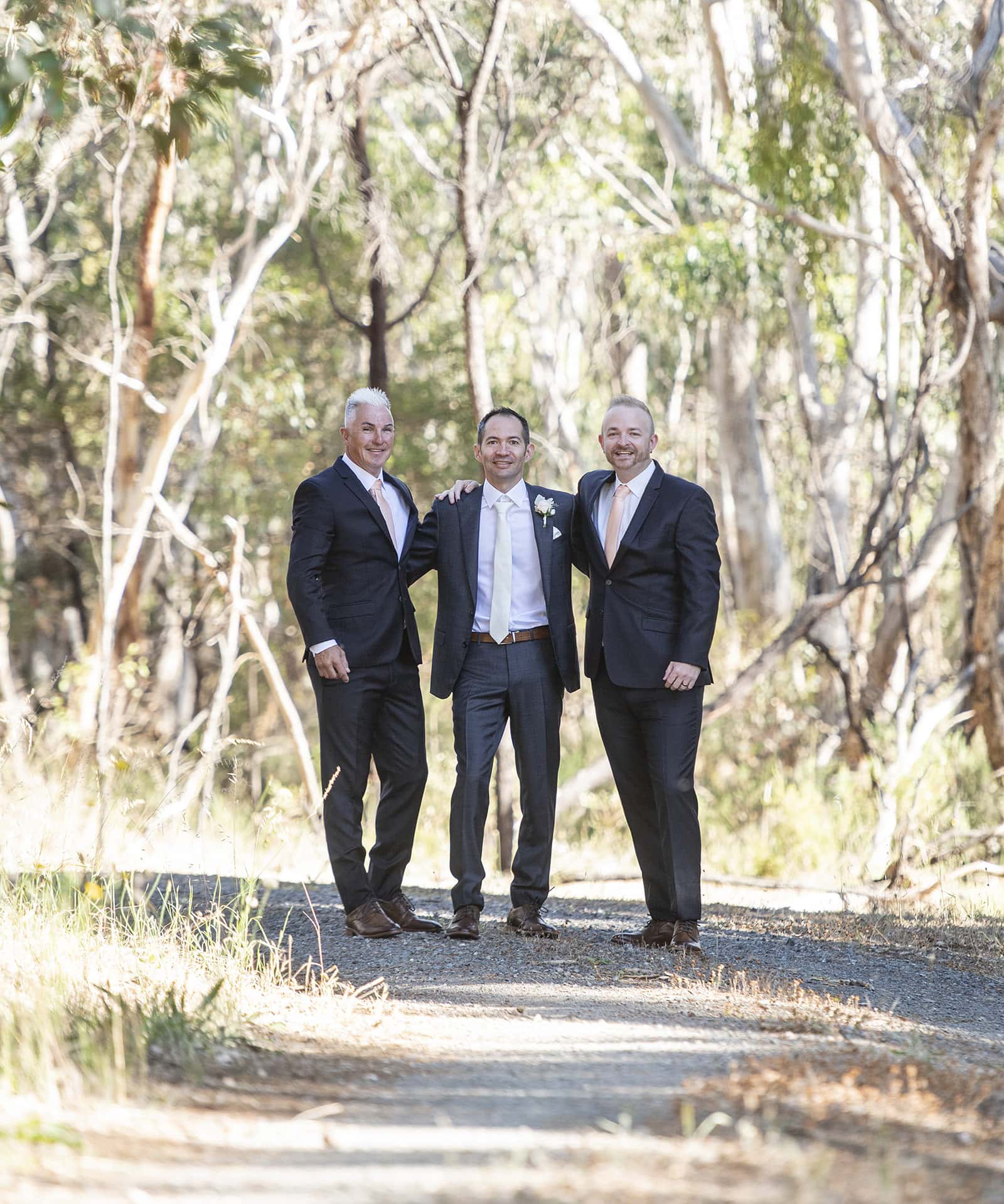 coriole wines wedding - marielle & brendan 9 Groomsmen together on roadway