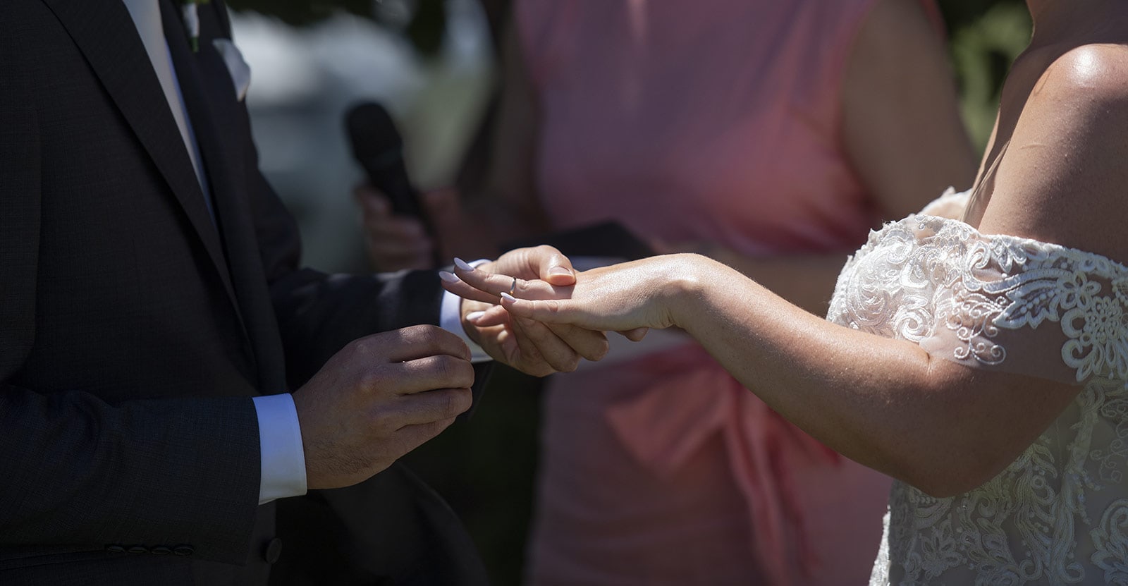 coriole wines wedding - marielle & brendan 42 Placing wedding ring on hand